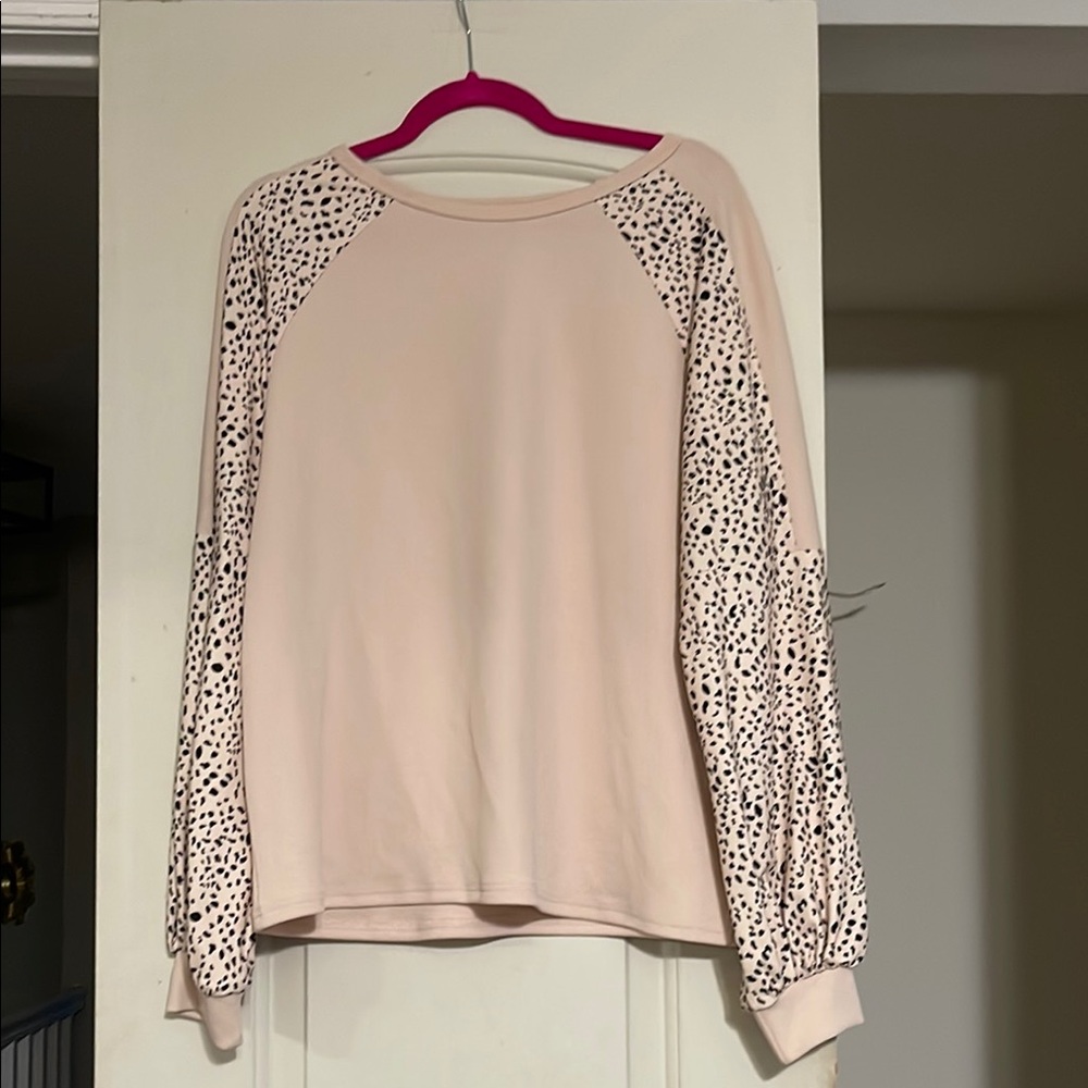 Women's Cream Top with Black Patterned Sleeves